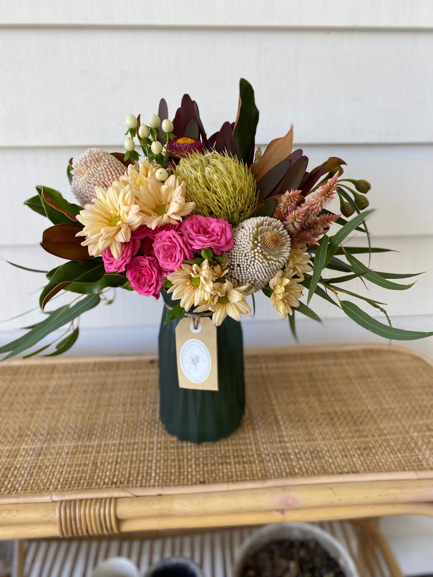 Mixed posy in glass vase in
