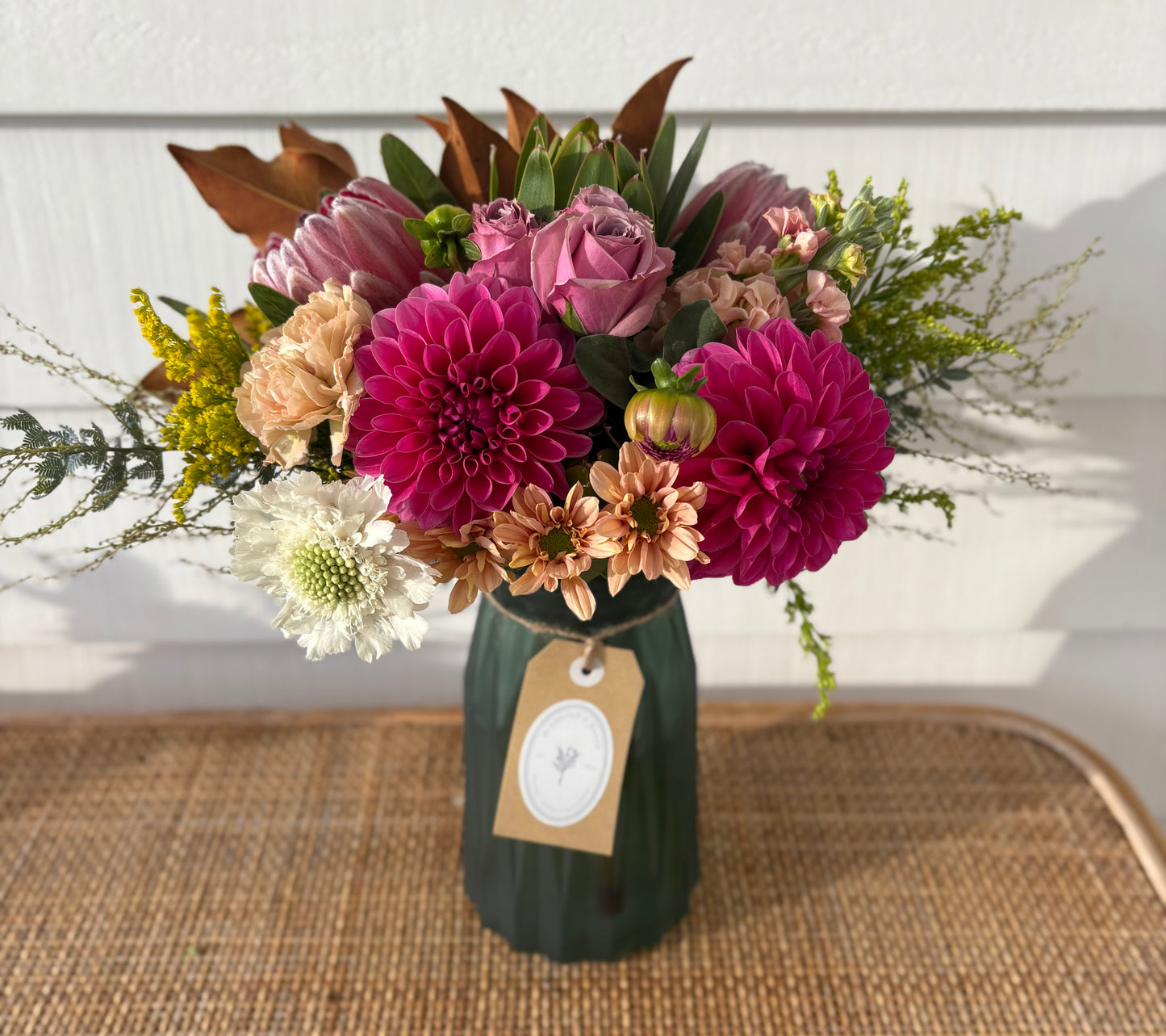 Mother’s Day mixed posy in a vase .