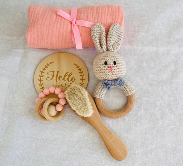 Handmade Rabbit Crochet Rattle Knitted, Newborn Baby Gift Set together with a small posy in a vase.