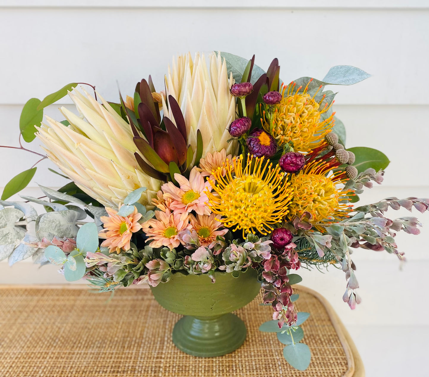 Large Christmas arrangement in a ceramic pot