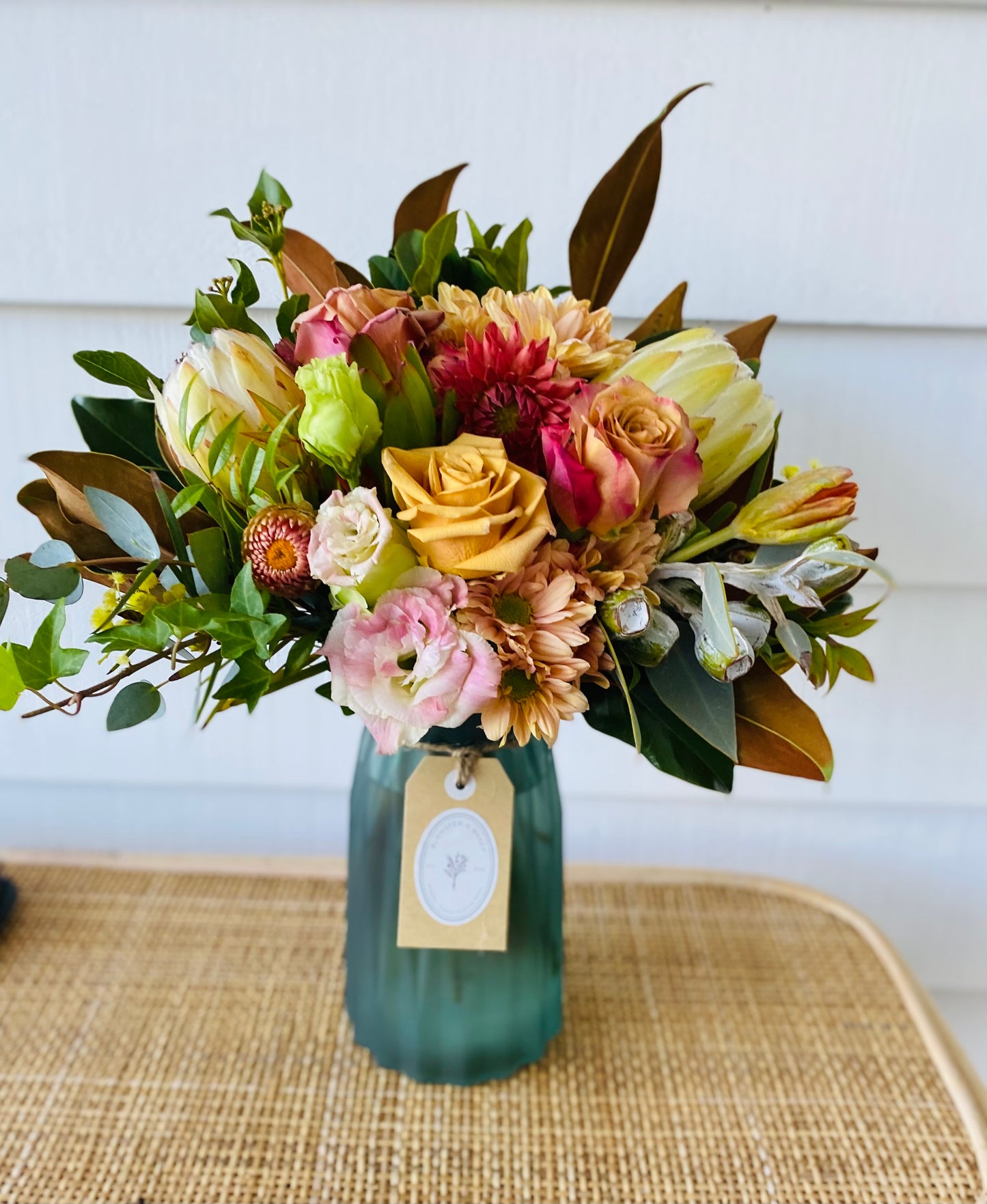 Mother’s Day mixed posy in a vase .