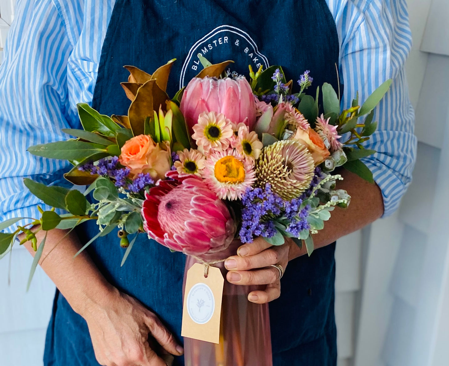 Mother’s Day mixed posy in a vase .