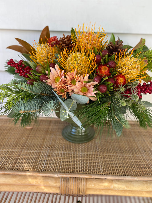 Large Christmas arrangement in a ceramic pot