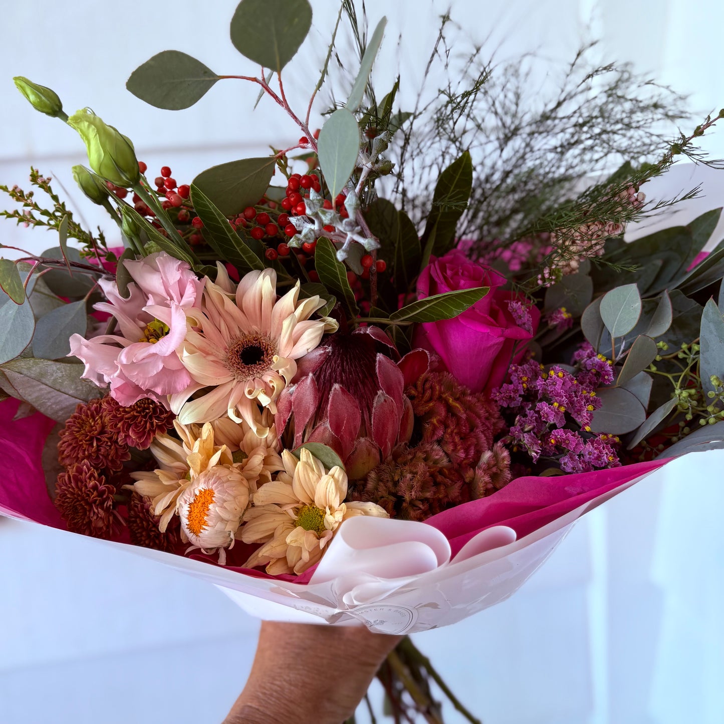 Valentine Special ; A medium  mixed bouquet of locally grown flowers and foliage