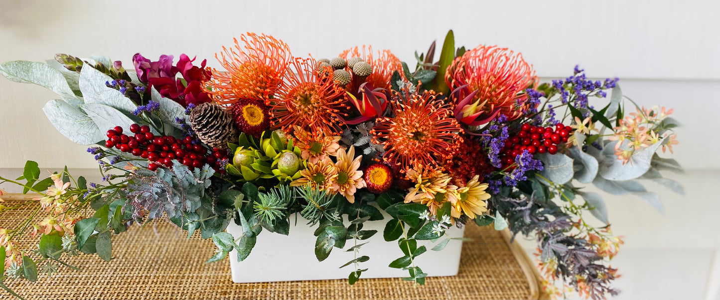 Christmas posy  in a ceramic boat