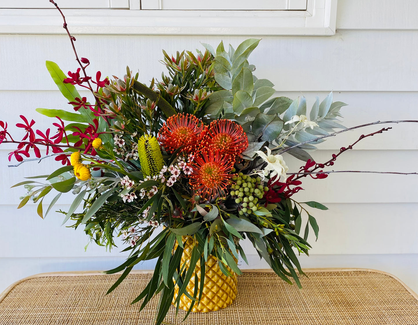 Large Christmas arrangement in a ceramic pot